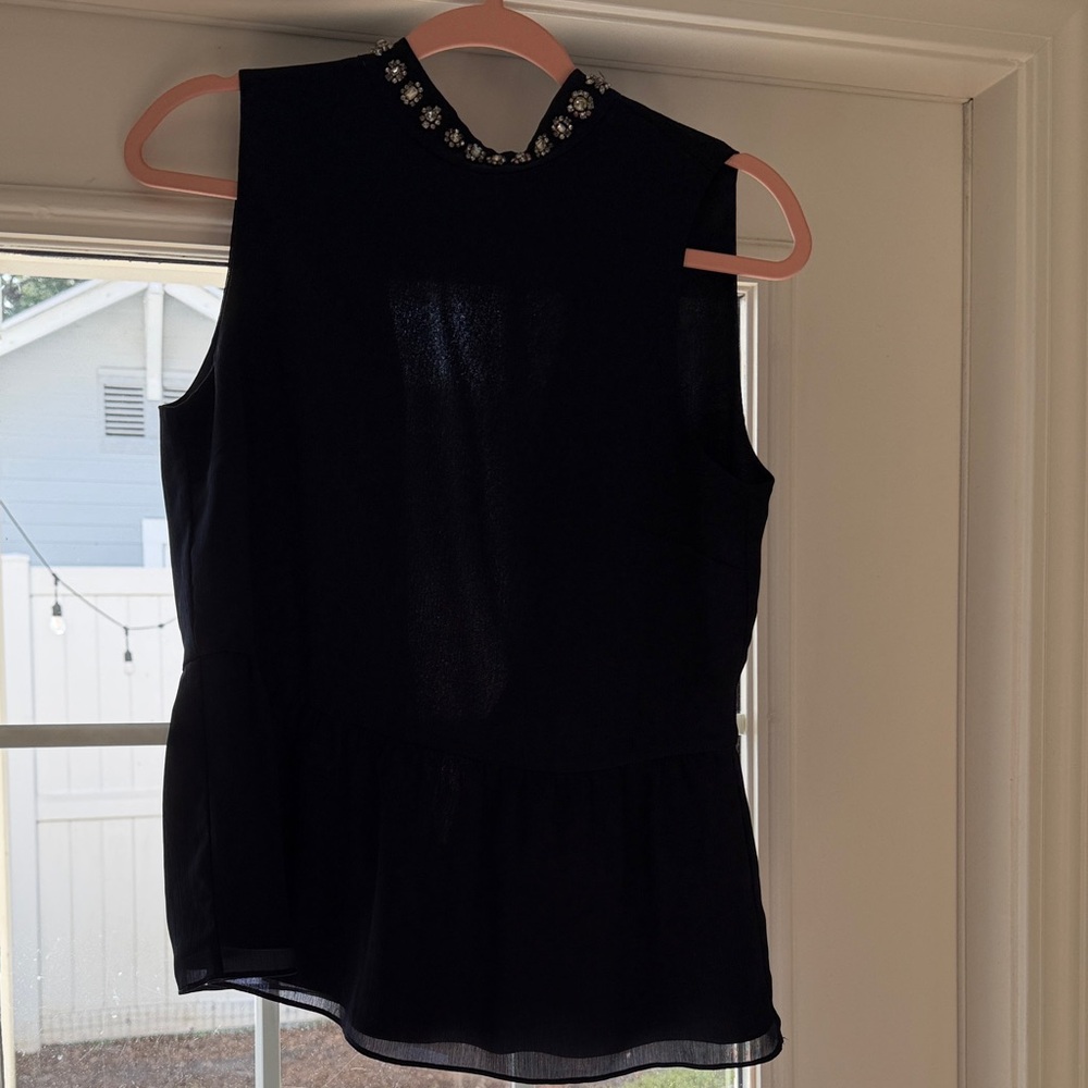 Sleeveless Mock Neck Peplum Top with Embellished Collar